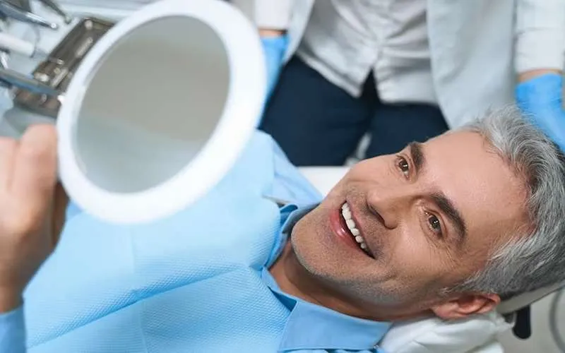 انواع ایمپلنت دندان بر اساس نحوه اتصال روکش و پایه